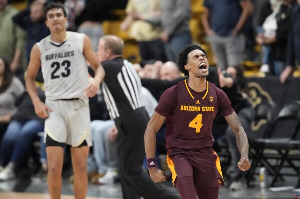 Arizona State guard Desmond Cambridge Jr. (4) reacts after hitting the winning 3-point basket as Colorado forward Tristan da Silva (23) looks on in the second half of an NCAA college basketball game Thursday, Dec. 1, 2022, in Boulder, Colo. (AP Photo/David Zalubowski)