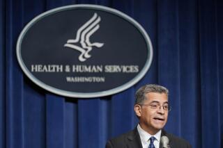 FILE - Health and Human Services Secretary Xavier Becerra speaks during a news conference June 28, 2022, in Washington. The number of people living in America without health insurance coverage hit an all-time low of 8 percent this year, the U.S. Department of Health and Human Services announced Tuesday, Aug. 2, 2022. (AP Photo/Patrick Semansky, File)
