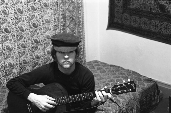This undated 1969 photo shows a self portrait of Mark Goff who was a credentialed photographer covering Woodstock in 1969. Goff, who at the time worked for an underground paper in Milwaukee, shot hundreds of images. Some were published, but the negatives were filed away at his Milwaukee home and barely mentioned as Goff raised two daughters, changed careers and, last November, died of cancer. Dozens of Goff's Woodstock shots are being displayed 50 years later. (Mark Goff Photography, Leah Demarco/Allison Goff via AP)