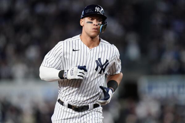 New York Yankees' Aaron Judge runs the bases after hitting a two-run home run during the third inning of a baseball game against the Cleveland Guardians, Friday, April 22, 2022, in New York. (AP Photo/Frank Franklin II)