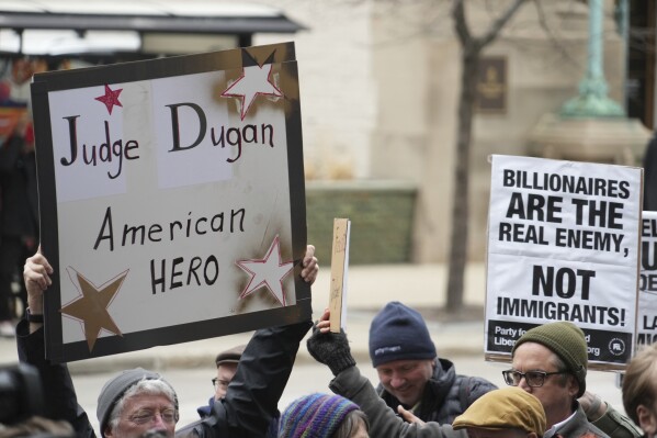 Supporters of Judge Hannah Dugan hold a rally in Milwaukee at the U.S. Courthouse in Milwaukee on Friday, April 25, 2025. (Lee Matz/Milwaukee Independent via AP)