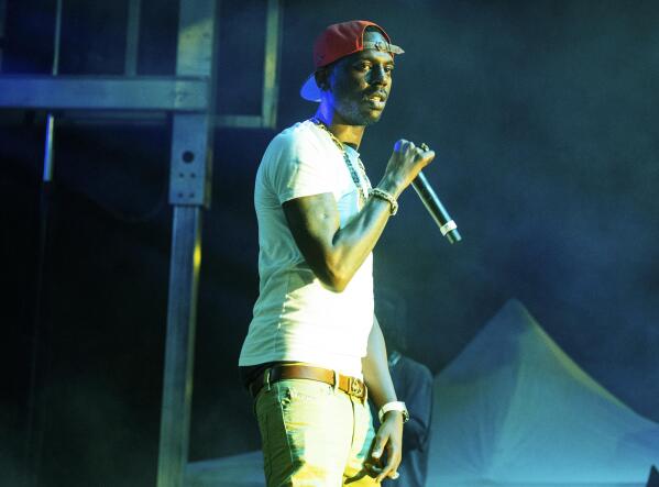 FILE - Young Dolph performs at The Parking Lot Concert in Atlanta on Sunday, Aug. 23, 2020. Officials say rapper Young Dolph has been fatally shot at a cookie shop in his hometown of Memphis, Tennessee, and a search is underway for the shooter. (Photo by Paul R. Giunta/Invision/AP, File)