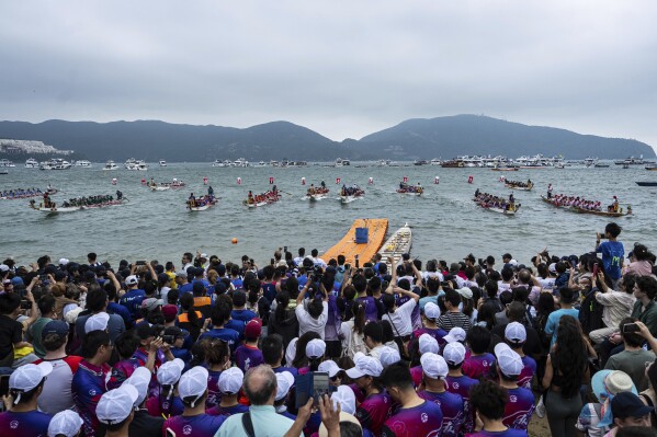 Competitors take part in the Stanley International Dragon Boat Championships to celebrate the Dragon Boat Festival in Hong Kong, Saturday, May 31, 2025. (AP Photo/Chan Long Hei)