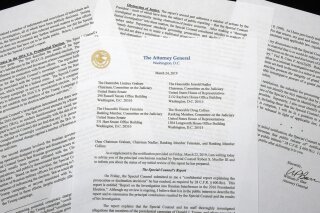 
              A copy of a letter from Attorney General William Barr advising Congress of the principal conclusions reached by Special Counsel Robert Mueller, is shown Sunday, March 24, 2019 in Washington. (AP Photo/Jon Elswick)
            