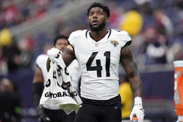 FILE -Jacksonville Jaguars linebacker Josh Allen (41) during an NFL football game against the Houston Texans Sunday, Nov. 26, 2023, in Houston. A person familiar with negotiations, Wednesday, April 10, 2024, says Allen and the Jacksonville Jaguars have reached agreement on a five-year, $150 million contract that includes $88 million guaranteed. The person spoke to The Associated Press on condition of anonymity because the deal had not officially been signed or announced.(AP Photo/Eric Gay, File)