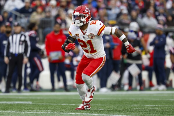 FILE -Kansas City Chiefs safety Mike Edwards (21) drops into coverage during the second half of an NFL football game against the New England Patriots on Sunday, Dec. 17, 2023, in Foxborough, Mass. After helping the Chiefs end the Bills' season for a third time in four playoff meetings in January, safety Mike Edwards hopes he can be part of revamped secondary to push Buffalo further. The Buffalo Bills signed Edwards to a one-year contract on Wednesday, March 20, 2024. (AP Photo/Greg M. Cooper, File)