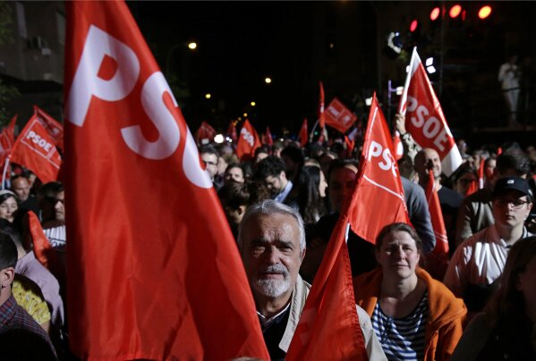 
              Supporters of Spanish Prime Minister and Socialist Party candidate Pedro Sanchez react as they gather at the party headquarters waiting for results of the general election in Madrid, Sunday, April 28, 2019. A divided Spain voted Sunday in its third general election in four years, with all eyes on whether a far-right party will enter Parliament for the first time in decades and potentially help unseat the Socialist government. (AP Photo/Andrea Comas)
            