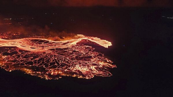 A volcano in southwestern Iceland erupted Thursday, Aug. 22, 2024, for the sixth time since December, spewing red lava through a new fissure on the Reykjanes Peninsula. (Iceland Civil Defense via AP)