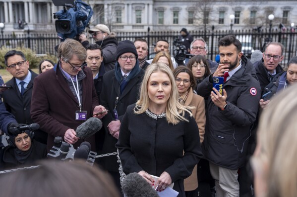 White House press secretary Karoline Leavitt speaks with reporters at the White House, Thursday, Feb. 6, 2025, in Washington. (AP Photo/Alex Brandon)