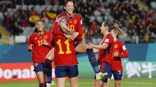 Spain's Jennifer Hermoso jumps into the arms of teammate Alexia Putellas celebrating after scoring her side's second goal during the Women's World Cup Group C soccer match between Spain and Zambia at Eden Park in Auckland, New Zealand, Wednesday, July 26, 2023. (AP Photo/Abbie Parr)