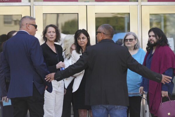 Family and supporters of Erik and Lyle Menendez leave court for a lunch break during a hearing in the brothers' case Tuesday, May 13, 2025, in Los Angeles. (AP Photo/Damian Dovarganes)