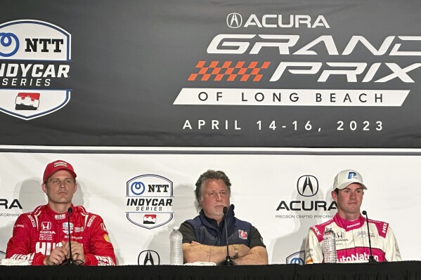FILE - Marcus Ericsson, left, Michael Andretti, center, and Kyle Kirkwood attend a news conference for the IndyCar Grand Prix of Long Beach auto race, Saturday, April 15, 2023 in Long Beach, Calif. Former Indianapolis 500 champion Marcus Ericsson, of Sweden, is leaving Chip Ganassi Racing and moving to Andretti Autosport after this season. Andretti Autosport made the announcement Wednesday, Aug. 23, 2023, adding Ericsson to a lineup that features Colton Herta and Kyle Kirkwood. (AP Photo/Jenna Fryer, File)
