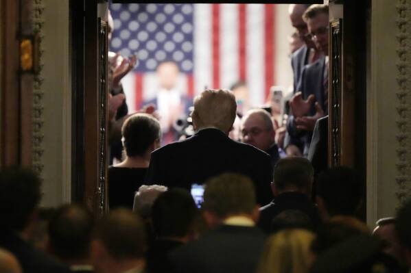 President Donald Trump arrives to address a joint session of Congress at the Capitol in Washington, Tuesday, March 4, 2025. (AP Photo/Ben Curtis)