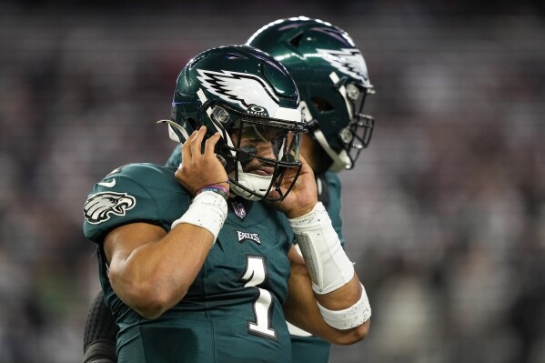 Eagles' Jalen Hurts questionable for Monday night vs Seahawks because of  illness, AP source says | AP News