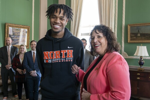 North High School basketball player Carl-Hens Beliard meets Lt. Gov. Kim Driscoll during a tour of the Massachusetts Statehouse on April 26, 2023, in Boston. Beliard, an 18-year-old Salem State University student, was fatally shot in Salem early Wednesday morning, Nov 1, 2023, according to Essex County District Attorney Paul Tucker. (Rick Cinclair/Worcester Telegram & Gazette via AP)