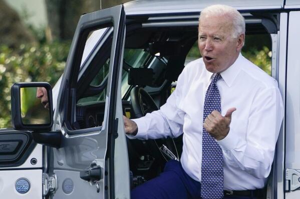 President Joe Biden talks after driving Jeep Wrangler 4xe Rubicon on the South Lawn of the White House in Washington, Thursday, Aug. 5, 2021, during an event on clean cars and trucks. (AP Photo/Susan Walsh)