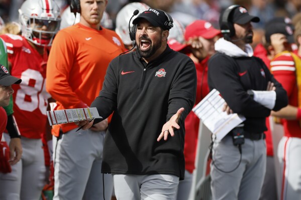 Ohio State head coach Ryan Day questions a referee's call during the second half of an NCAA college football game against Maryland, Saturday, Oct. 7, 2023, in Columbus, Ohio. (AP Photo/Jay LaPrete)