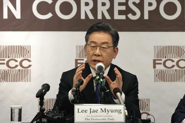 Lee Jae-myung, the presidential candidate of the ruling Democratic Party, speaks during a press conference at the Seoul Foreign Correspondent Club in Seoul, South Korea, Thursday, Nov. 25, 2021. Lee said Thursday he will maintain Seoul's conciliatory approach toward North Korea if elected and questioned the effectiveness of U.S.-led economic sanctions in persuading the North to abandon its nuclear ambitions. (Yonhap via AP)