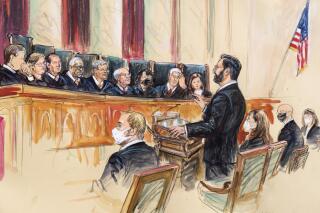 FILE - This artist sketch depicts Marc Hearron, petitioner for Whole Woman's Health, standing while speaking to the Supreme Court, Monday, Nov. 1, 2021, in Washington. Seated to Hearron's left is Judd Stone II, Texas Solicitor General. Justices seated from left are Associate Justice Brett Kavanaugh, Associate Justice Elena Kagan, Associate Justice Samuel Alito, Associate Justice Clarence Thomas, Chief Justice John Roberts, Associate Justice Stephen Breyer, Associate Justice Sonia Sotomayor, Associated Justice Neil Gorsuch and Associate Justice Amy Coney Barrett. (Dana Verkouteren via AP, File)