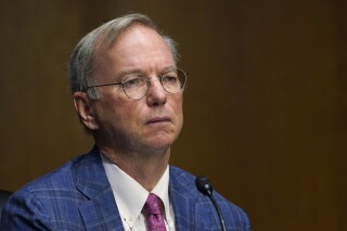 FILE - Eric E. Schmidt, co-founder of Schmidt Futures, listens on Capitol Hill in Washington, Tuesday, Feb. 23, 2021, during a hearing on emerging technologies and their impact on national security. While technology experts sound the alarm on the pace of artificial-intelligence development, philanthropists — including long-established foundations and tech billionaires, including Schmidt and his wife, Wendy — have been responding with an uptick in grants. (AP Photo/Susan Walsh, File)