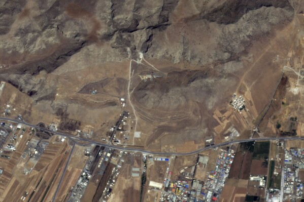 This satellite image from Planet Labs PBC shows an Iranian missile base near Kermanshah, Iran, Thursday, June 12, 2025. (Planet Labs PBC via AP)