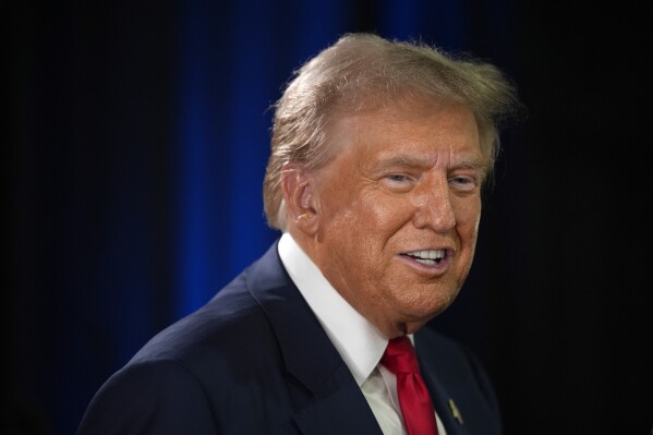 Republican presidential nominee former President Donald Trump speaks to reporters in the spin room after a presidential debate with Democratic presidential nominee Vice President Kamala Harris, Tuesday, Sept. 10, 2024, in Philadelphia. (AP Photo/Matt Slocum)