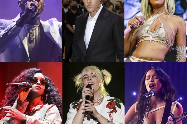 This combination of photos shows the top nominees for the upcoming Grammy Awards, top row from left, Jon Baptiste with 11 nominations, Justin Bieber, Doja Cat, and H.E.R, each with eight noms and Billie Eilish and Olivia Rodrigo with seven nominations each. (AP Photo)