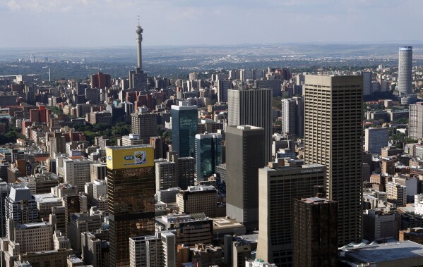 FILE - Johannesburg is seen from the sky, Oct. 18, 2009. Johannesburg has established itself as one of the best cities in the world, South Africa's economic hub where careers are made and dreams come true. But over the last few years, that image and reputation has been changing. (AP Photo/Themba Hadebe, File)
