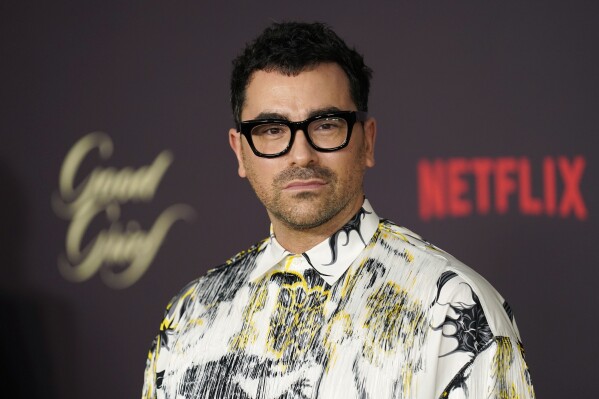 Daniel Levy, writer/director of "Good Grief," as well as a cast member, poses at the premiere of the Netflix film at the Egyptian Theatre, Tuesday, Dec. 19, 2023, in Los Angeles. (AP Photo/Chris Pizzello)