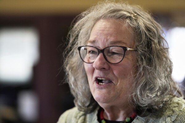 Tracy Baggot answers a question during a town hall meeting at the George Culver Community Library Thursday, March 6, 2025, in Sauk City, Wis. (AP Photo/Morry Gash)