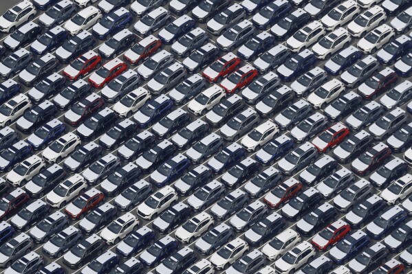 This photo shows vehicles bound for foreign countries at a logistics center in Kawasaki near Tokyo, Thursday, March 27, 2025. (Michi Ono/Kyodo News via AP)