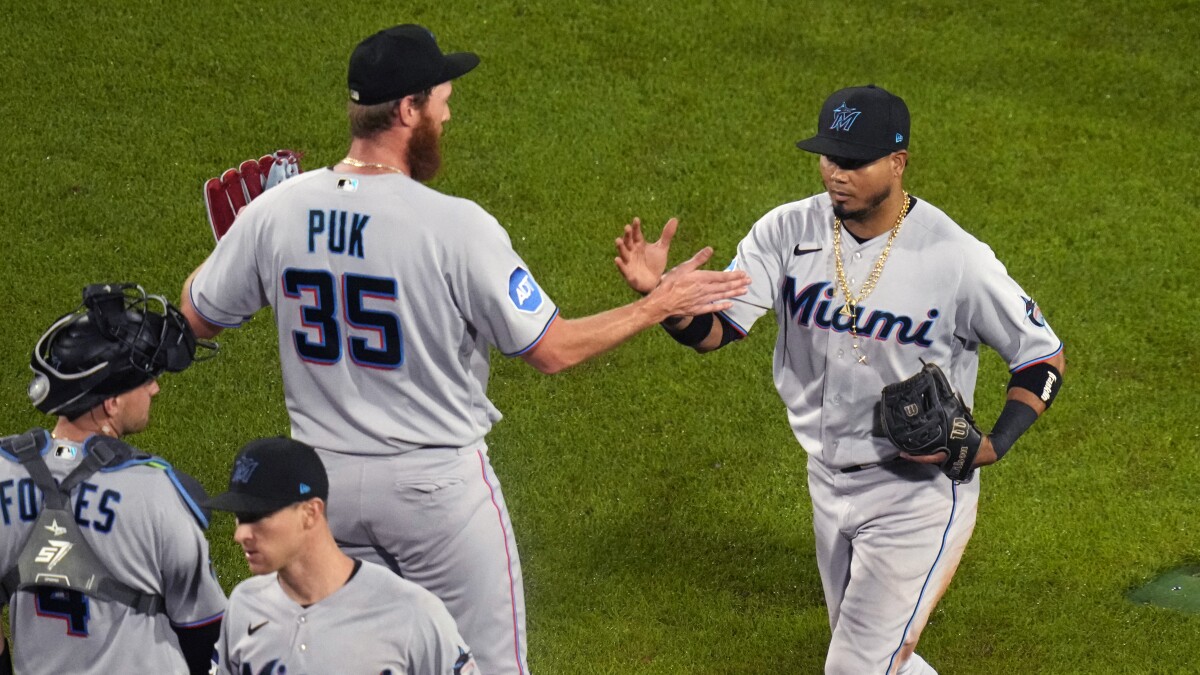 Miami Marlins relief pitcher A.J. Puk delivers during the ninth