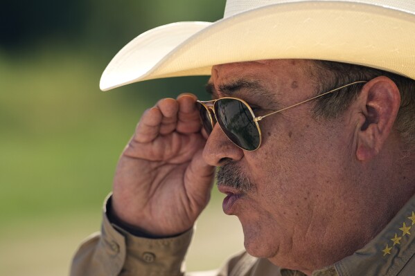 Maverick County Sheriff Tom Schmerber talks about the immigration challenges facing his country, Thursday, Oct. 19, 2023, in Eagle Pass, Texas. (AP Photo/Eric Gay)