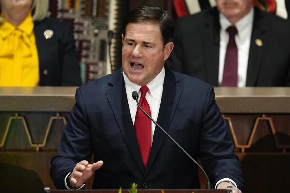 FILE - Arizona Republican Gov. Doug Ducey gives his state of the state address at the Arizona Capitol, Monday, Jan. 10, 2022, in Phoenix. Ducey has endorsed businesswoman Karrin Taylor Robson to be his successor. Ducey on Thursday added his name to a growing list of mainstream conservatives looking to boost the businesswoman past Donald Trump-endorsed frontrunner Kari Lake. (AP Photo/Ross D. Franklin, File)