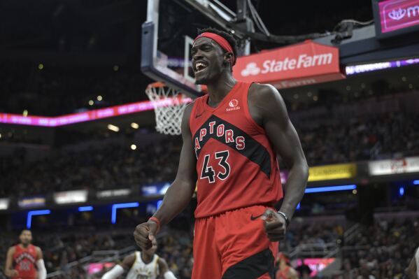 Toronto Raptors forward Pascal Siakam reacts after a making a basket during the second half of the team's NBA basketball game against the Indiana Pacers on Wednesday, Nov. 22, 2023, in Indianapolis. (AP Photo/Marc Lebryk)