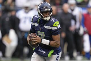 Seattle's QB Smith worries he's been too aggressive of late