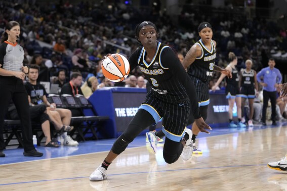 FILE - Chicago Sky's Kahleah Copper drives to the basket during a WNBA basketball game against the Seattle Storm Friday, July 28, 2023, in Chicago. Copper is heading home to Rutgers as an assistant on the women's basketball team. The Chicago Sky's star wing will be the team's Director of Athletic Culture and Professional Development.(AP Photo/Charles Rex Arbogast, File)