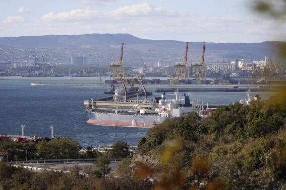 FILE - An oil tanker is moored at the Sheskharis complex, part of Chernomortransneft JSC, a subsidiary of Transneft PJSC, in Novorossiysk, Russia, on Oct. 11, 2022, one of the largest facilities for oil and petroleum products in southern Russia. For months after Ukraine's Western allies limited sales of Russian oil to $60 per barrel, the price cap was still largely symbolic. Most of Moscow's crude — its main moneymaker — cost less than that.(AP Photo, File)