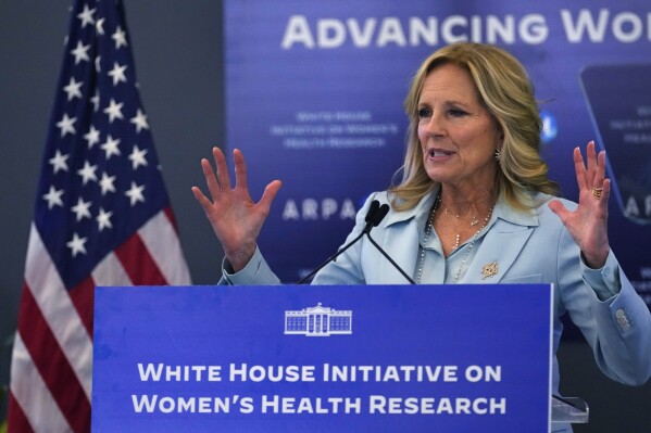 First lady Jill Biden addresses a gathering during a discussion on women's health research, Wednesday, Feb. 21, 2024, in Cambridge, Mass. (AP Photo/Charles Krupa, Pool)