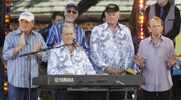 Members of The Beach Boys, from left, Bruce Johnston, David Marks, rear, Brian Wilson, Mike Love and Al Jardine appear during ABC's "Good Morning America" summer concert series, on June 15, 2012, in New York. (Photo by Jason DeCrow/Invision/AP, File)