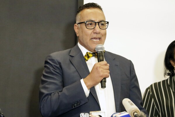 FILE - Cabinet Secretary ministry of tourism and wildlife Najib Balala addressing the public during the reopening of the hotel complex in Nairobi, Kenya, Wednesday, July 31, 2019. Kenya’s anti-corruption commission Friday, Dec. 22, 2023, charged the country's former tourism minister and two other officials with economic crimes for the alleged fraud of tens of millions of dollars in inflated costs for the construction of a hospitality college on the East African coast. Balala is the first high profile person to be charged with corruption under President William Ruto’s rule. (AP Photo/Khalil Senosi, File)