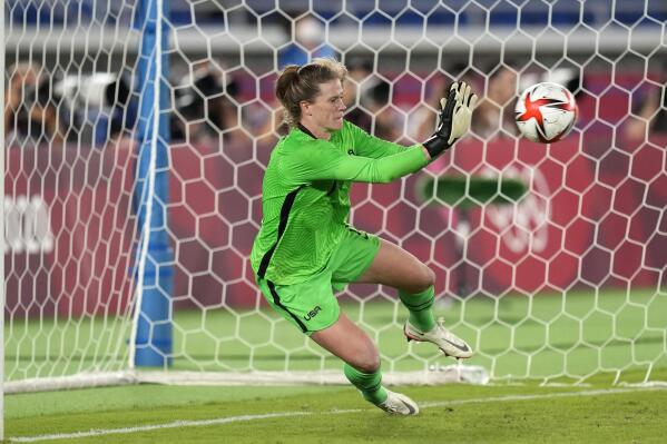 United States' goalkeeper Alyssa Naeher stops a ball in a the penalty shootout against Netherlands during a women's quarterfinal soccer match at the 2020 Summer Olympics, Friday, July 30, 2021, in Yokohama, Japan. (AP Photo/Silvia Izquierdo)