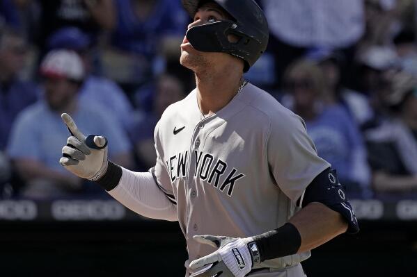 New York Yankees' Aaron Judge celebrates as he crosses the plate after hitting a solo home run during the ninth inning of a baseball game against the Kansas City Royals Sunday, May 1, 2022, in Kansas City, Mo. The Yankees won 6-4. (AP Photo/Charlie Riedel)