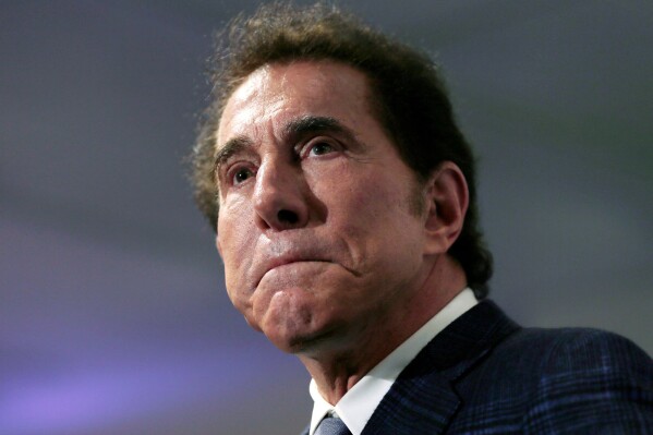 FILE - Casino mogul Steve Wynn pauses at a news conference in Medford, Mass., on March 15, 2016. The Nevada Supreme Court on Thursday, Feb 8, 2024, dismissed a defamation lawsuit against The Associated Press based on a story about accounts to Las Vegas police from two women who alleged sexual misconduct by former casino mogul Wynn.(AP Photo/Charles Krupa, File)
