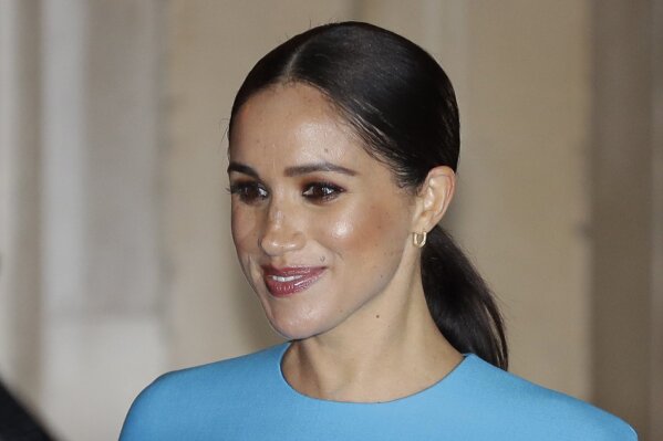 FILE - In this file photo dated Thursday, March 5, 2020,  Britain's Meghan, the Duchess of Sussex leaves after attending the annual Endeavour Fund Awards in London.  A British newspaper publisher on Tuesday March 2, 2021, is seeking permission to appeal against a judge’s ruling that it invaded the privacy of the Duchess of Sussex by publishing parts of a letter she wrote to her estranged father after her 2018 marriage to Prince Harry. (AP Photo/Kirsty Wigglesworth, FILE)