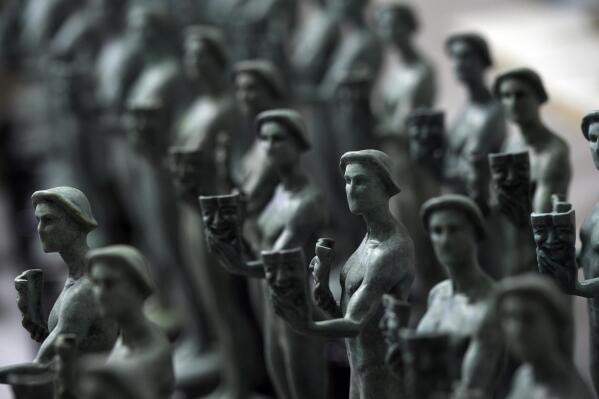FILE - Finished Actor statuettes are displayed during the 25th annual Casting of the Screen Actors Guild Awards at American Fine Arts Foundry on Jan. 15, 2019, in Burbank, Calif. The 2022 SAG Awards will take place on Feb. 27. (Photo by Chris Pizzello/Invision/AP, File)