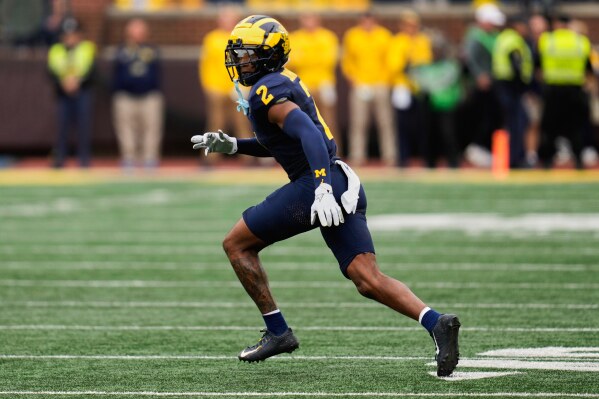 Michigan defensive back Will Johnson follows a play against Texas in the first half of an NCAA college football game in Ann Arbor, Mich., Saturday, Sept. 7, 2024. (AP Photo/Paul Sancya, File)
