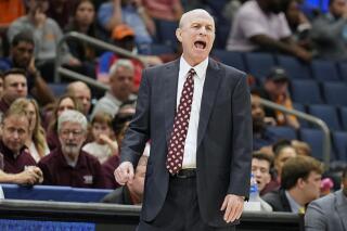 Mississippi State head coach Ben Howland shouts to players during the first half of an NCAA men's college basketball game against South Carolina at the Southeastern Conference tournament in Tampa, Fla., Thursday, March 10, 2022. (AP Photo/Chris O'Meara)