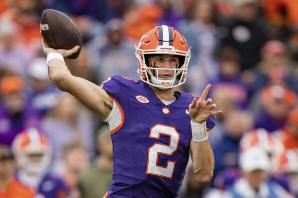 Clemson quarterback Cade Klubnik passes the ball during the first half of an NCAA college football game against Georgia Tech, Saturday, Nov. 11, 2023, in Clemson, S.C. (AP Photo/Jacob Kupferman)