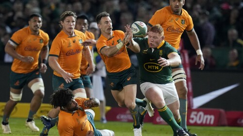 South Africa's Steven Kisthoff, right, challenges Australia's Nic White centre, during the Rugby Championship test match between South Africa and Australia at Loftus Versfeld stadium in Pretoria, South Africa, Saturday, July 8, 2023. (AP Photo/Themba Hadebe)